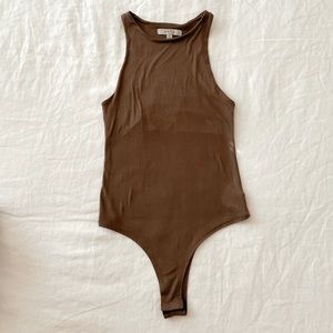 Brown body suit